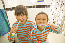 Photo of children brushing their teeth