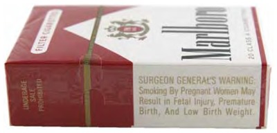 Figure 6.5—Photograph depicts the written health warning on cigarette packs in the United States. The warnings consist of the following written statements: (1) SURGEON GENERAL’S WARNING: Smoking Causes Lung Cancer, Heart Disease, Emphysema, and May Complicate Pregnancy; (2) SURGEON GENERAL’S WARNING: Quitting Smoking Now Greatly Reduces Serious Risks to Your Health; (3) SURGEON GENERAL’S WARNING: Smoking By Pregnant Women May Result in Fetal Injury, Premature Birth, and Low Birth Weight [as shown in this figure by the photograph of a pack of Marlboro brand cigarettes]; and (4) SURGEON GENERAL’S WARNING: Cigarette Smoke Contains Carbon Monoxide. Underage sale prohibited.